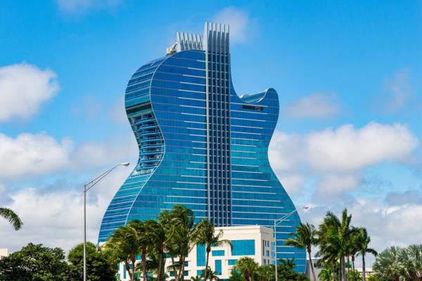 The Seminole Hard Rock Hotel in Hollywood, FL does allow gambling within its distinctive guitar-shaped facade. 