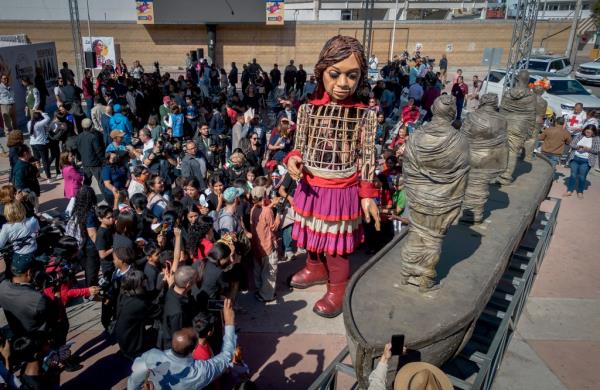 A llarge wooden doll named 