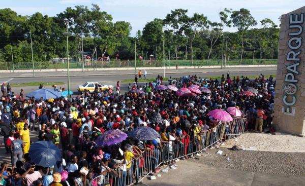 Hundreds of migrants wait for their docu<em></em>ments to be checked at the Tapachula Ecopark on Oct. 23, 2023.