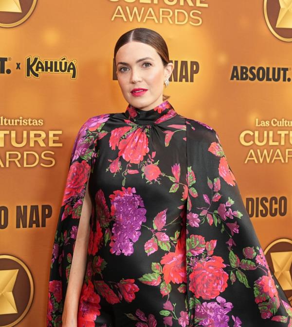 Mandy Moore feels like a member of the paparazzi is following her “everywher<em></em>e.” 