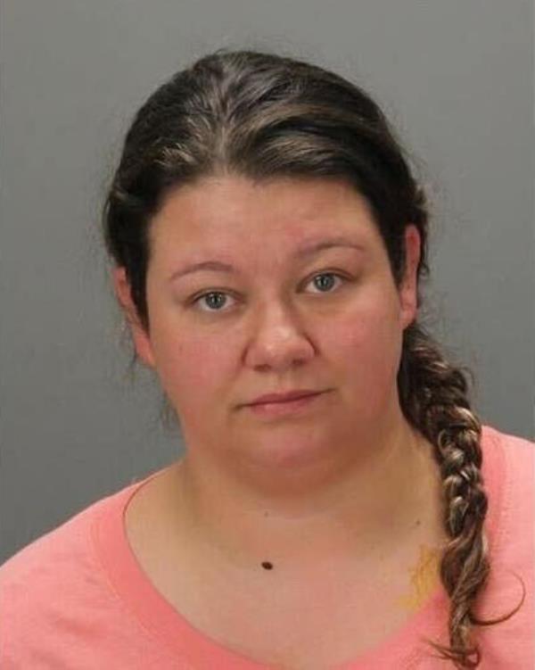 McClure was arrested for sodomy and animal abuse for the alleged assault of her dog, Max. 