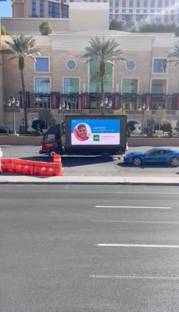 Sasha Troufanov's friends hired trucks to project his face around the Las Vegas conference.