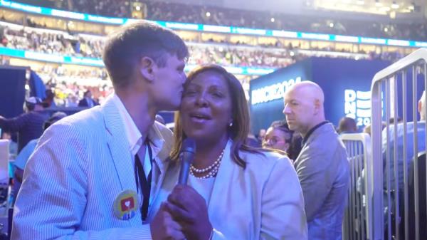 Jerry Nadler making a promise a<em></em>bout implementing new taxes, while kissing Letitia James on the cheek