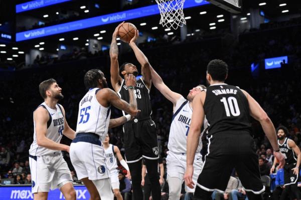 Nic Claxton, who scored nine points and grabbed 11 rebounds, goes up for a shot during the Nets' loss.