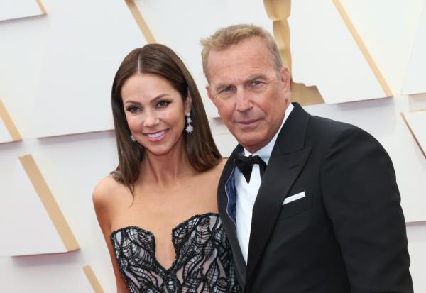 (L-R) Christine Baumgartner and Kevin Costner attend the 94th Annual Academy Awards at Hollywood and Highland on March 27, 2022.