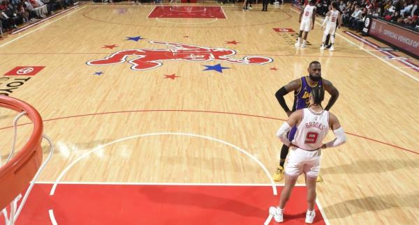 LeBron James #23 of the Los Angeles Lakers and Dillon Brooks #9 of the Houston Rockets stare at each other during the game on November 8, 2023
