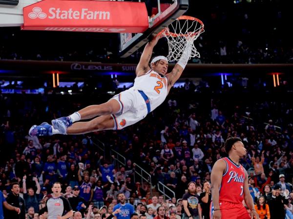 Miles McBride slams home a dunk during the Knicks' Game 1 win over the 76ers.