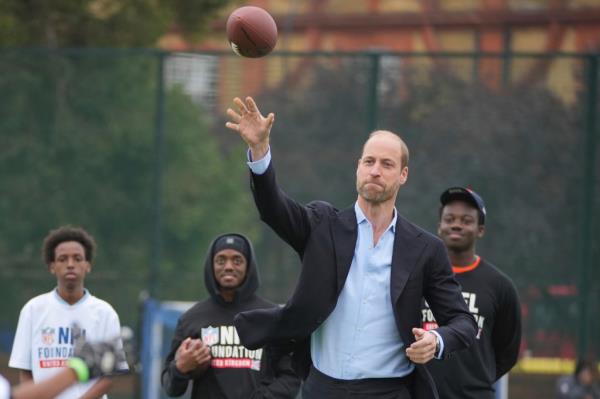 Prince William throwing a football at a a NFL flag football event in Lo<em></em>ndon on Oct. 15, 2024.