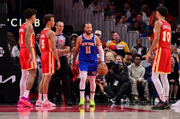 Jalen Brunson #11 of the New York Knicks handles the ball during the game against the Atlanta Hawks on November 6, 2024 at State Farm Arena in Atlanta, Georgia.