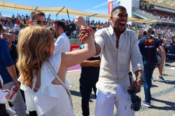 AUSTIN, TEXAS - OCTOBER 22: Geri Haliwell-Horner fake punches British professio<em></em>nal boxer Anthony Joshua on the grid prior to the F1 Grand Prix of United States at Circuit of The Americas on October 22, 2023 in Austin, Texas. (Photo by Kym Illman/Getty Images)