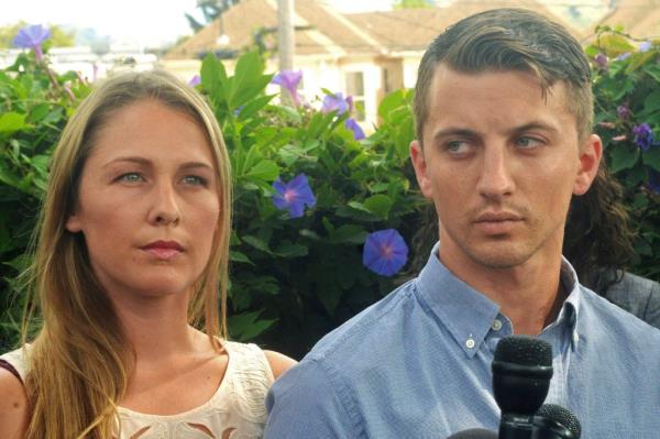 A man and woman, Denise Huskins and Aaron Quinn with their attorneys at a news co<em></em>nference as their ordeal is highlighted by a Netflix docu<em></em>mentary.