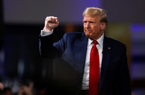 Former U.S. President and Republican presidential candidate Do<em></em>nald Trump gestures as he participates in a Fox News town hall with Laura Ingraham in Greenville, South Carolina, U.S. February 20, 2024. 