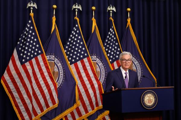 Federal Reserve Bank Chair Jerome Powell announcing unchanged interest rates at a news co<em></em>nference in Washington, DC