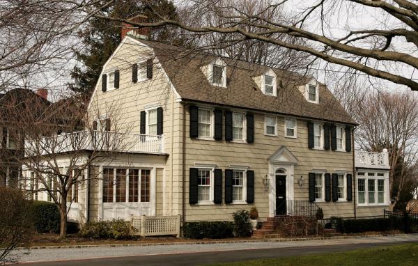 Real estate photograph of a house located at 112 Ocean Avenue in the town of Amityville, New York March 31, 2005. The Amityville Horror house rich history and beauty are overshadowed by the story of George and Kathy Lutz, the previous residents of 112 Ocean Avenue, who claimed that shortly after moving into the house they fled in terror driven out by paranormal activity
