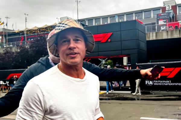 Brad Pitt walks outside the paddock ahead of the Formula One Grand Prix at the Spa-Francorchamps racetrack in Spa, Belgium, Friday, July 26, 2024. Pitt stars in 