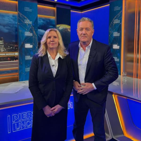 Laura Wray with Piers Morgan. 