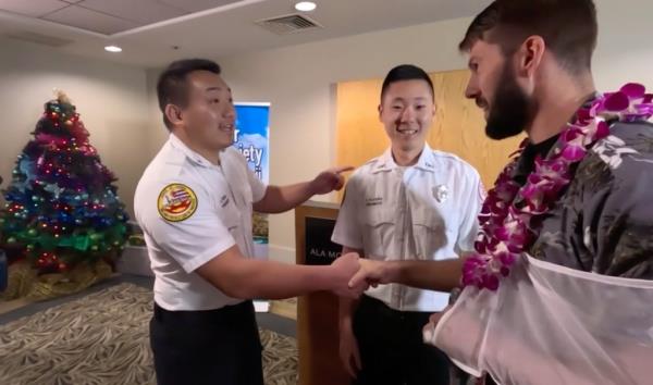 Snyder greeted members of the Ho<em></em>nolulu EMS unit who helped rescue him. 