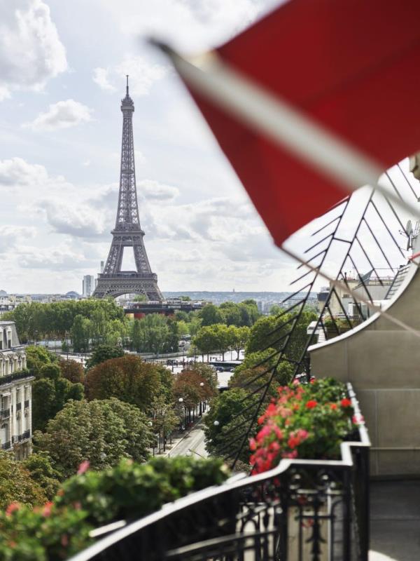 View of the Eiffel Tower from a balcony of the historic Hotel Plaza Athenee in Paris