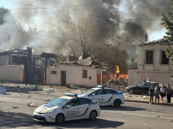 Police cars are seen at a site of a Russian missile strike in Kryvyi Rih amid Russia's war on Ukraine.