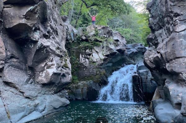 The waterfall is a popular destination.