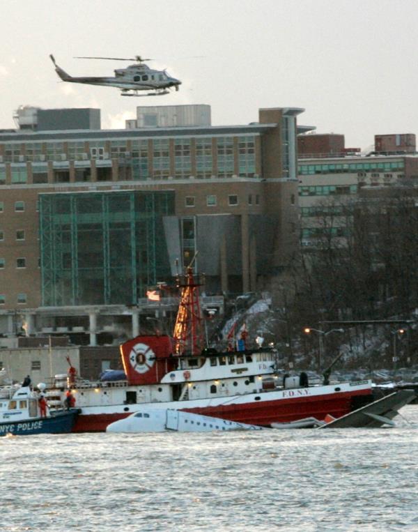 A US Airways plane is guided down the Hudson River 