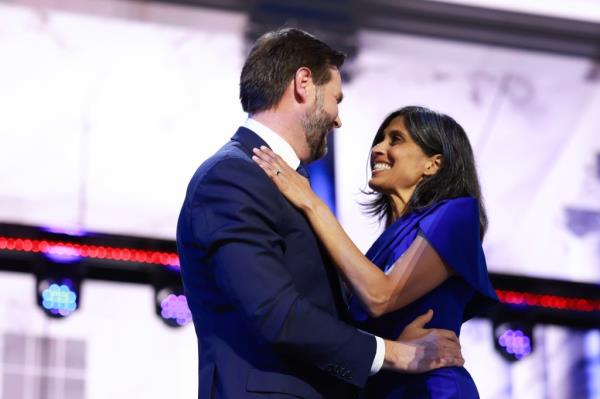 Usha Vance embraces her husband, Republican vice-presidential nominee J.D. Vance, on stage at the 2024 Republican Natio<em></em>nal Co<em></em>nvention in Milwaukee.