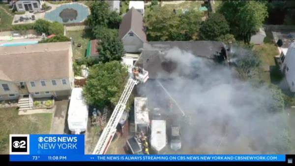 Juska said he and another neighbor ran toward the burning house and found the family's grandmother hanging out the back window.</p>

<p>　　