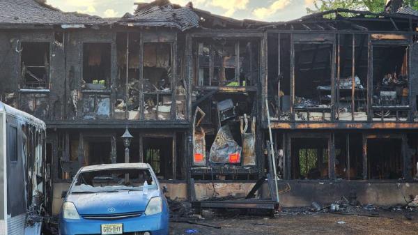 The house was fully engulfed in flames by the time firefighters arrived.
