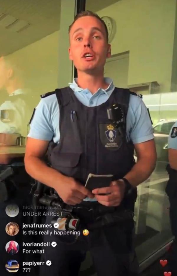 Minaj films her arrest.