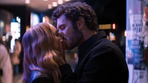 Kristen Bell and Adam Brody kissing. 