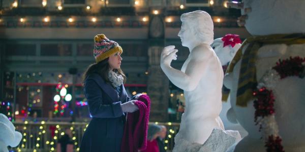 Lacey Chabert looking at a snowman