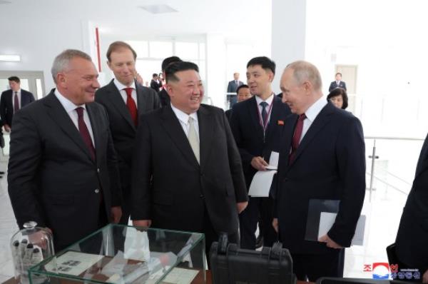 North Korean leader Kim Jong Un and Russia's President Vladimir Putin talk during a tour, in Russia, September 13, 2023 in this image released by North Korea's Korean Central News Agency. KCNA via REUTERS ATTENTION EDITORS - THIS IMAGE WAS PROVIDED BY A THIRD PARTY. REUTERS IS UNABLE TO INDEPENDENTLY VERIFY THIS IMAGE. NO THIRD PARTY SALES. SOUTH KOREA OUT. NO COMMERCIAL OR EDITORIAL SALES IN SOUTH KOREA.