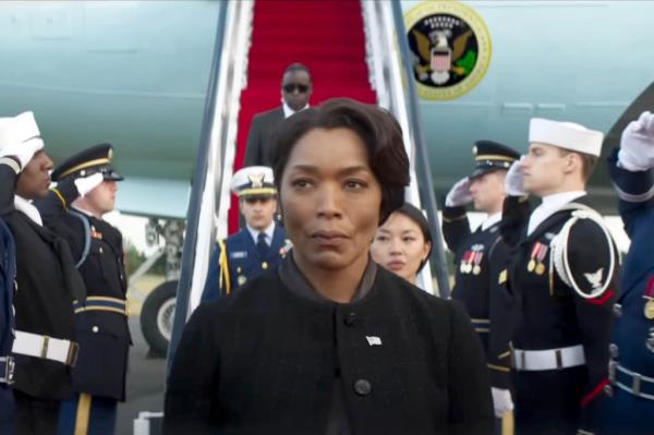 Angela Bassett in black military uniform standing on an airplane, Tom Cruise in Mission: Impossible - The Final Recko<em></em>ning trailer premiere announcement