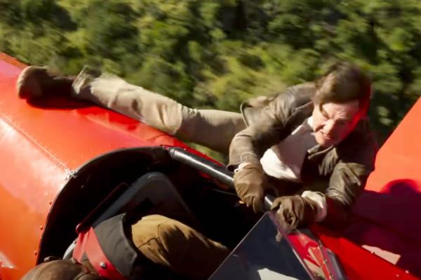 Tom Cruise in a scene from the trailer of Mission: Impossible - The Final Reckoning, falling off a red car