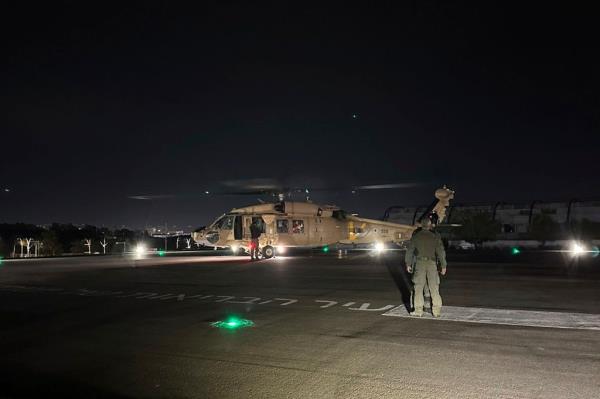 An Israeli Air Force helicopter is seen carrying two released hostages, at Sheba Medical Center in Ramat Gan, Israel, on Feb, 12. 2024. 