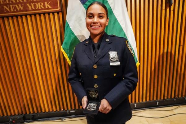 Officer Denise Gomez was reunited with the two NYPD officers who saved her from a  car fire when she was a baby in 1996.