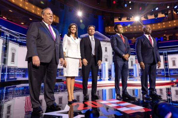 Former New Jersey Governor Chris Christie, former South Carolina Governor Nikki Haley, Florida Governor Ron DeSantis, US entrepreneur Vivek Ramaswamy and South Carolina Senator Tim Scott pose on stage prior to the GOP NBC News Republican Presidential Debate at the Adrienne Arsht Center for the Performing Arts of Miami-Dade County.
