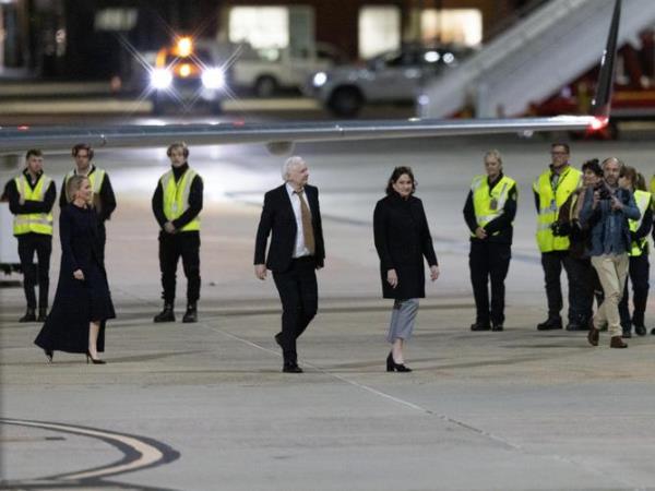 CANBERRA, AUSTRALIA - NewsWire Photos - JUNE 26, 2024: Australian WikiLeaks founder Julian Assange arrives back on Australian soil in Canberra havin<em></em>g signed a plea deal with the United States in Saipan following his detention in Belmarsh maximum security prison for almost 2000 days while fighting extradition to the US. Picture: NewsWire / Martin Ollman