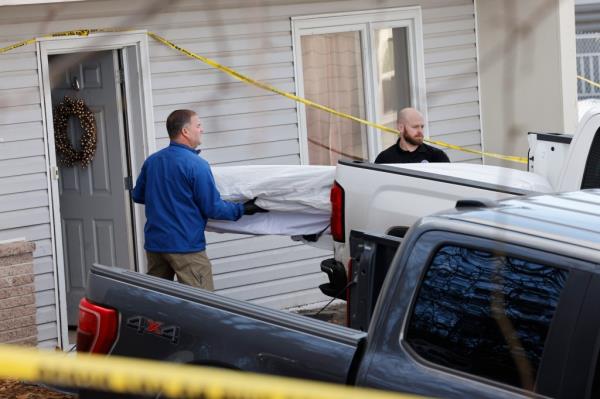 Police and forensics units came to remove bedding, blood-stained mattresses, furniture and perso<em></em>nal effects from 1122 King Road in Moscow, ID wher<em></em>e four University of Idaho students were killed.