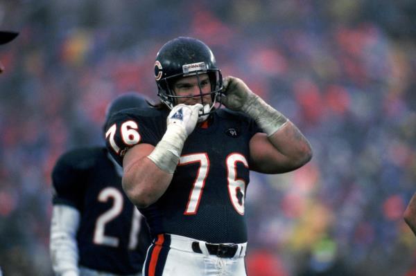 Steve McMichael #76 of the Chicago Bears removes his helmet during the game against the Kansas City Chiefs on December 30, 1990