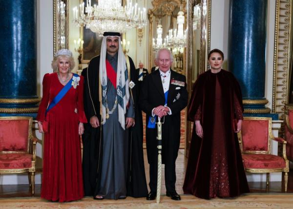 King Charles III and Queen Camilla posing with the Emir of Qatar, Sheikh Tamim bin Hamad Al Thani, and his wife Sheikha Jawaher bint Hamad bin Suhaim Al Thani at Buckingham Palace state banquet