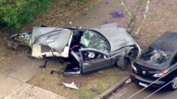 The force of the impact tore the car in half. Nine