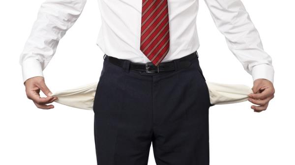 Guy pulling out empty pockets