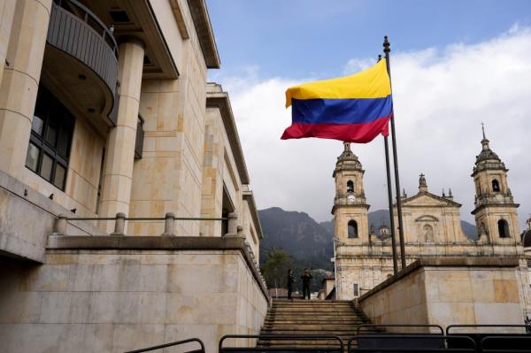 The Colombian flag flies at the Justice Palace in Bogota, Colombia, Friday, Aug. 16, 2024.