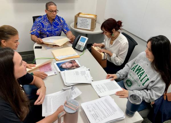 Hawaii Innocence Project co-director Kenneth Lawson, back center,