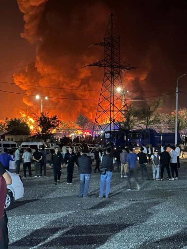 Video and photographs on social media showed flames soaring into the night sky and a huge cloud of smoke.