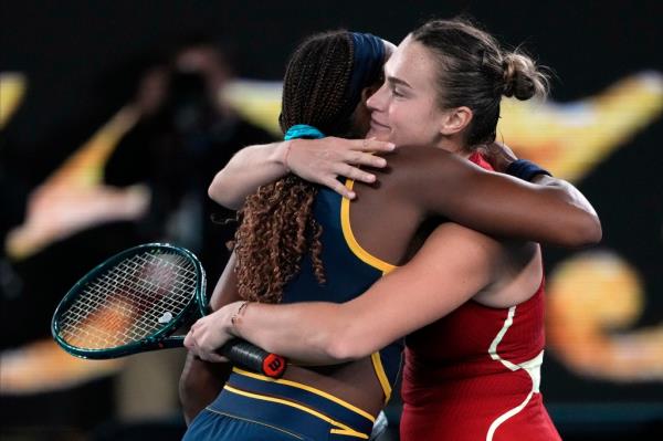 Sabalenka embraces Gauff following her se final win against the American on Jan. 25, 2024.