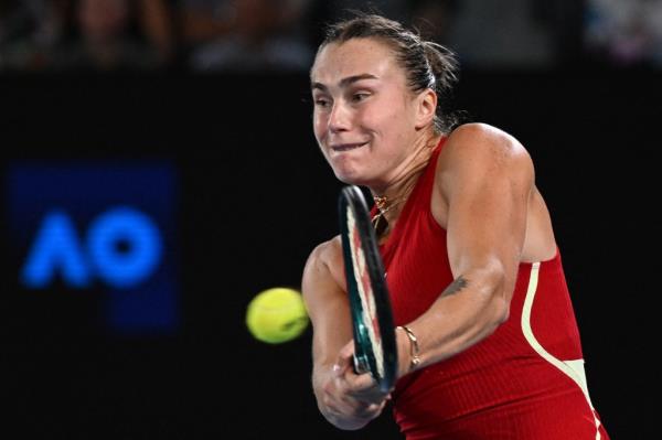 Sabalenka returns a shot against Gauff during the women's singles semi-final on Thursday in Melbourne, Australia.