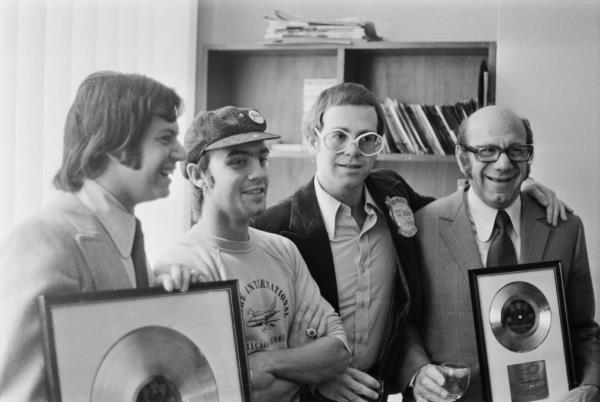 Stephen James, so<em></em>ngwriter Bernie Taupin, singer and pianist Elton John, and Stephen's father, music publisher Dick James (L-R), in October 1972.</p>

<p>　　