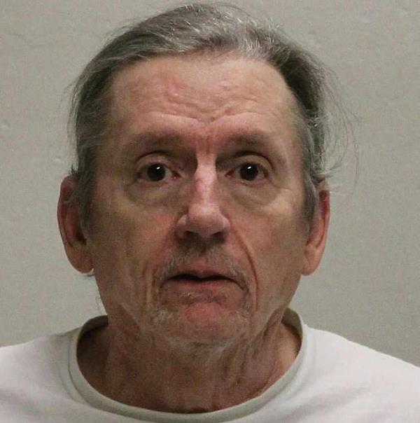 Livingston is pictured in a mugshot.